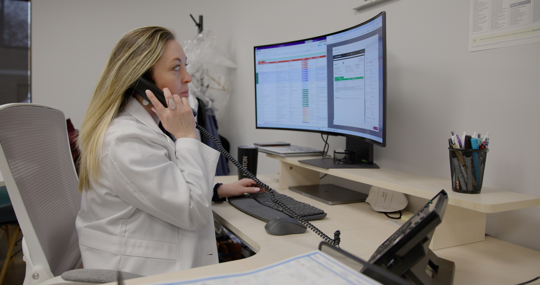 A Plum Health care team member on the phone with a patient