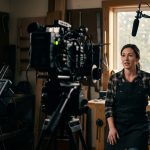 A small business owner on set of an interview.